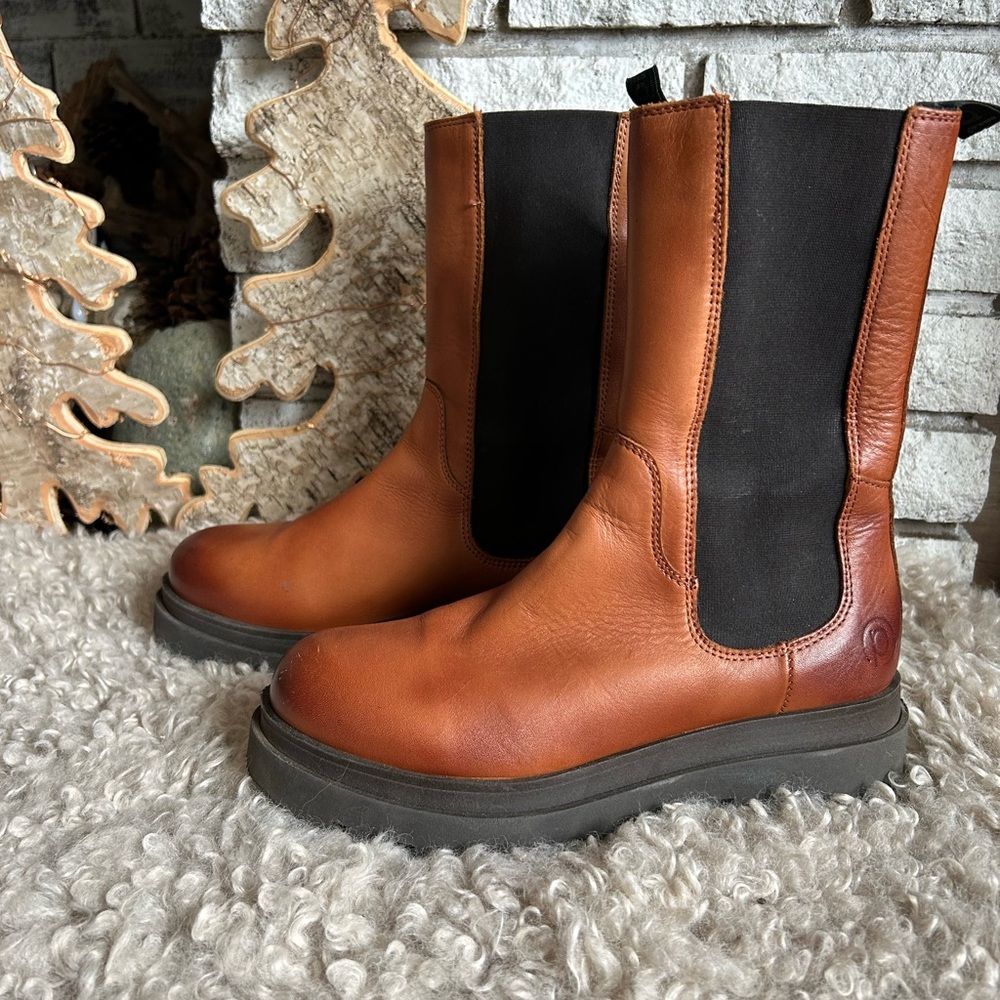 Pull on boots with a bit of a platform